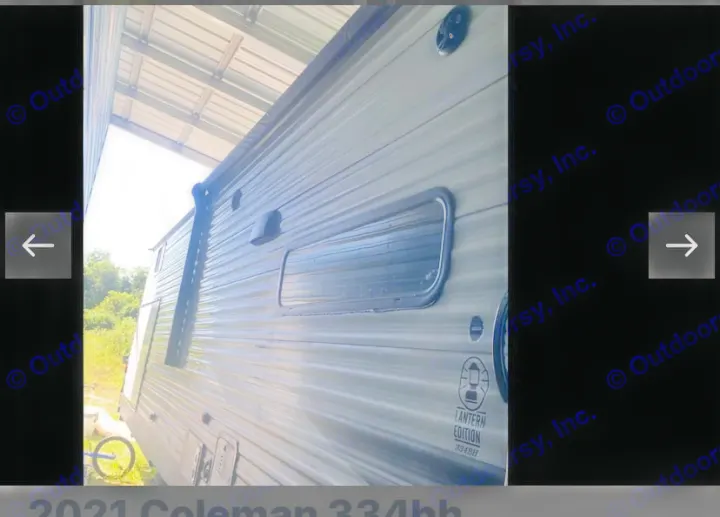 Side of a light-colored 2021 Coleman 334BH travel trailer, ideal for your next RV rental adventure.. Coachmen Lantern 2021
