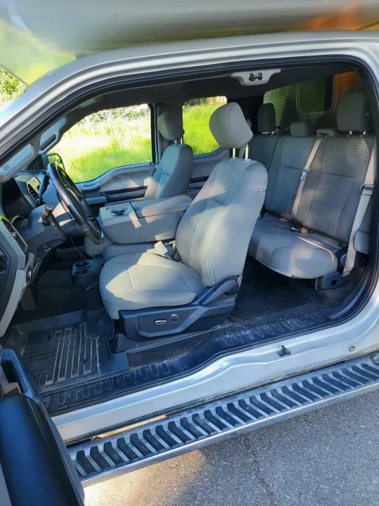 Spacious light grey truck interior, ready for travel or towing. Great option for your next RV rental adventure.. Ford Ford F150 2017