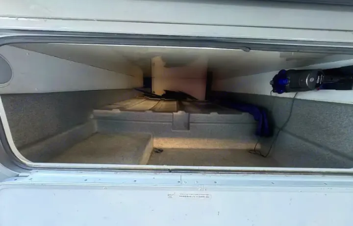 Spacious, empty storage compartment in an rv rental, ready for travel essentials and outdoor gear.. Forest River Forester 3171DS 2016