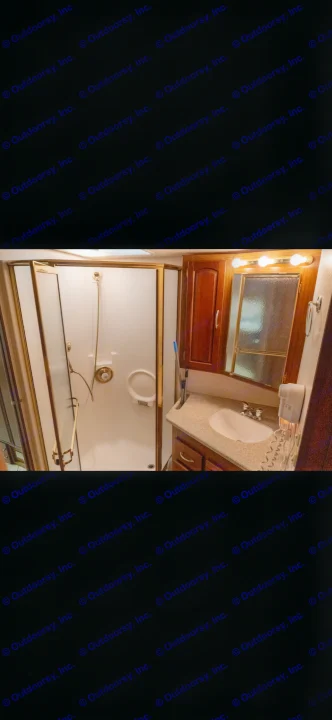 An RV rental's compact yet functional bathroom, featuring a corner shower, sink, and vanity.. Itasca Horizon 2002
