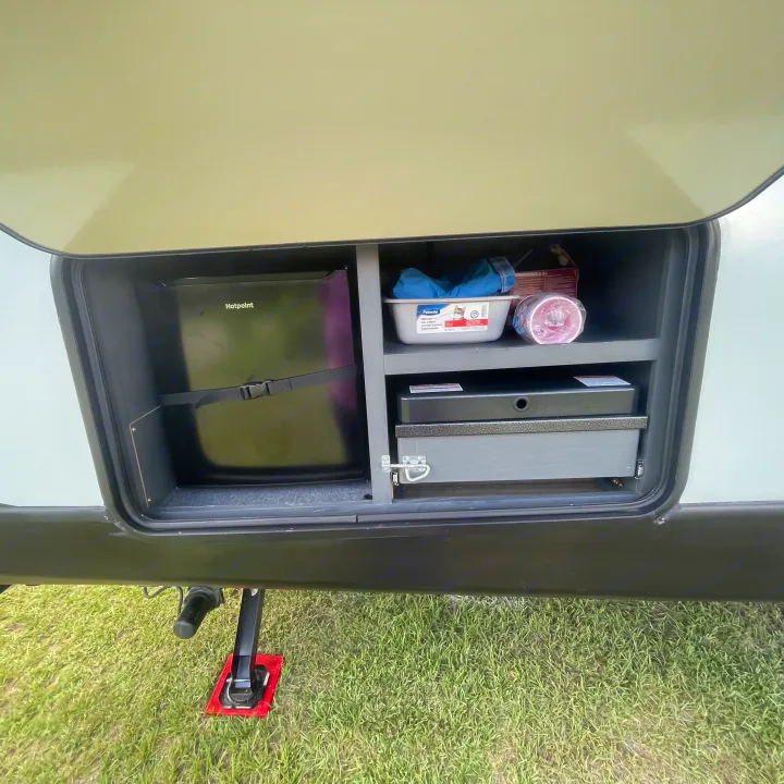 RV rental with convenient outdoor kitchen, mini-fridge, & storage for camping/pet essentials.. Keystone RV Bullet Ultra Lite 2022