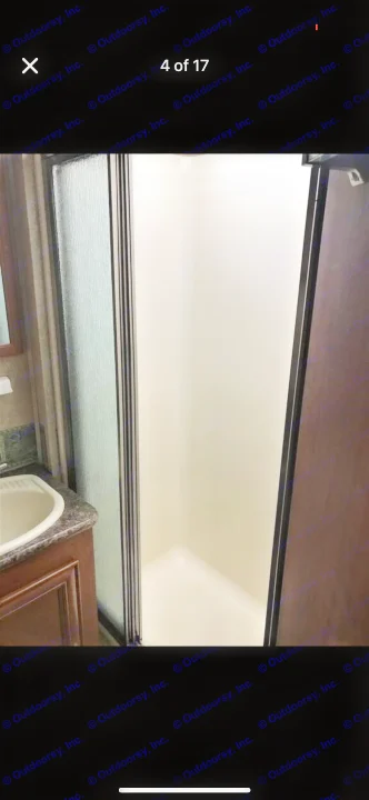RV rental: Compact shower with textured glass doors and sink area, perfect for on-the-go living.. Forest River Georgetown 320 DS 2011