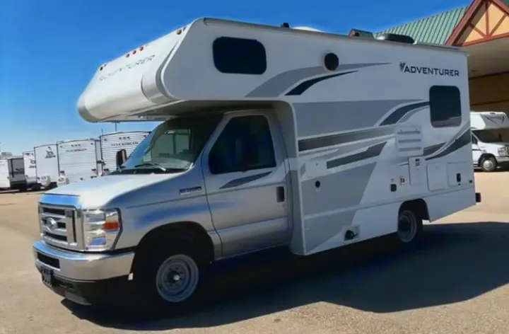 This clean white & silver Adventurer Class C RV, built on a Ford chassis, is ideal for an rv rental adventure or trip.. Adventurer 19RK113 2014