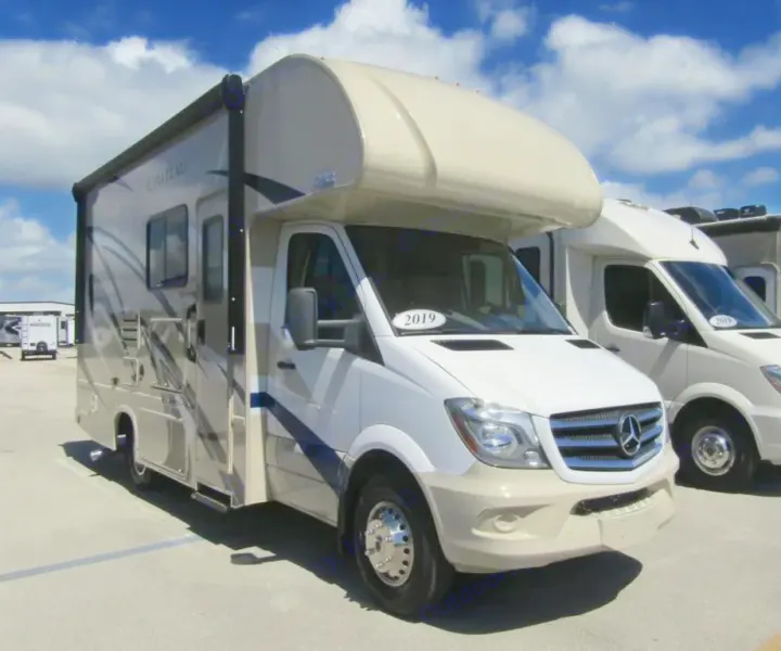 Spacious Class C RV rental, a 2019 Mercedes-Benz Sprinter motorhome, parked outdoors at a dealership.. Thor Chateau 2019
