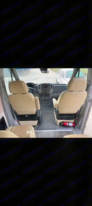 RV rental interior: View from the back showing tan captain's chairs, dashboard, and a fire extinguisher for safety.. Roadtrek Roadtrek Class B 2016