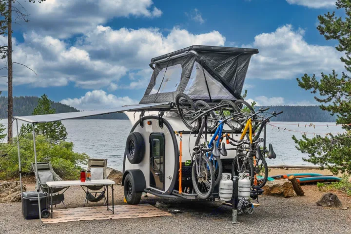 Lakeside RV rental: A teardrop camper with bikes, rooftop tent, and awning for an ultimate outdoor adventure.. Bean Trailer Bean Stock 2022