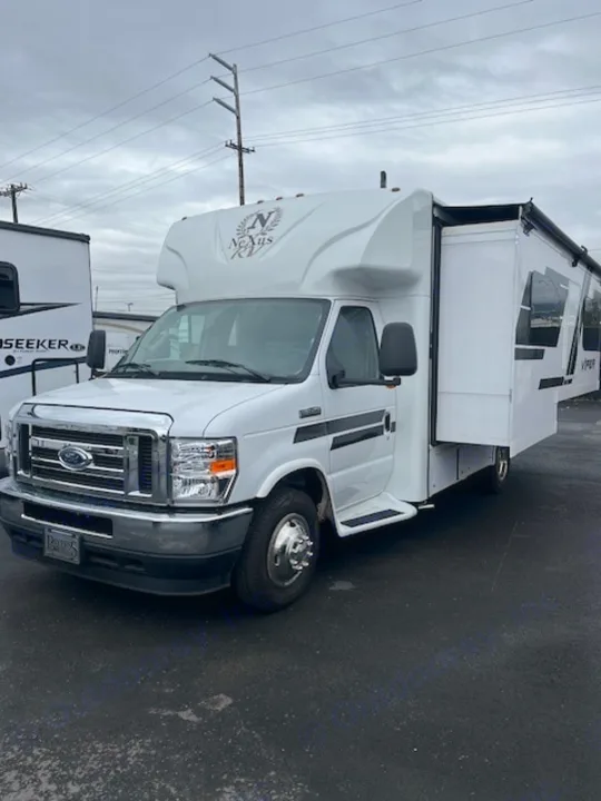 White Nexus Class C RV with an extended slide-out, ideal for your next rv rental adventure.. Nexus Viper 2026