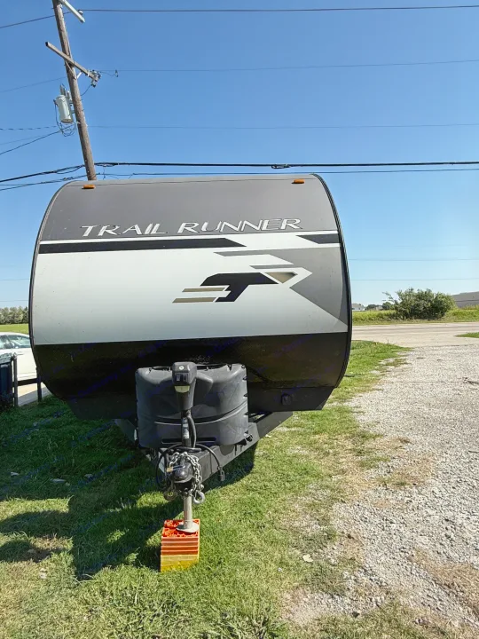 Front view of a "TRAIL RUNNER" travel trailer, ideal for RV rental adventures.. Heartland Trail Runner 2022