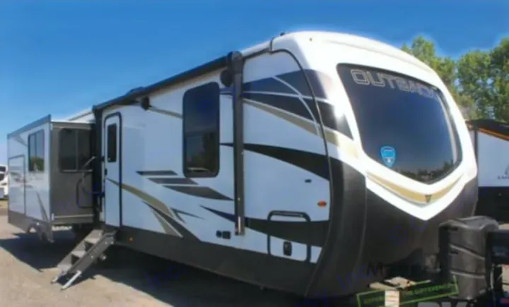 This travel trailer, an excellent option for an RV rental, features an extended slide-out and awning, ready for adventure.. Keystone RV Outback 2022
