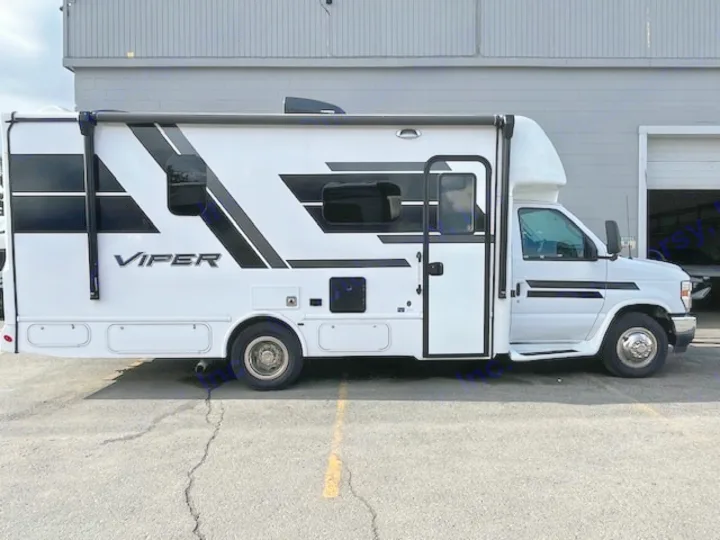 White Class C RV rental with striking black/gray stripes & "VIPER" text. A comfortable motorhome for your next adventure.. Nexus Viper 2026