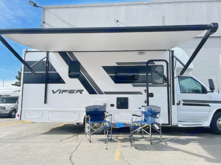 Experience comfort with this RV rental! Extended awning, chairs, and table make for comfortable outdoor camping relaxation.. Nexus Viper 2026