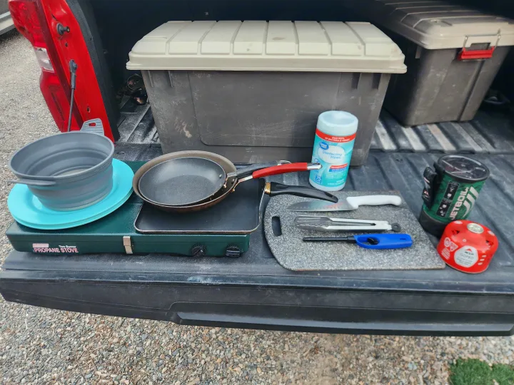 RV rental cooking gear: propane stove, pans, Jetboil, and wipes for camping meals.. Chevrolet Silverado 1500 Trail Boss 2020