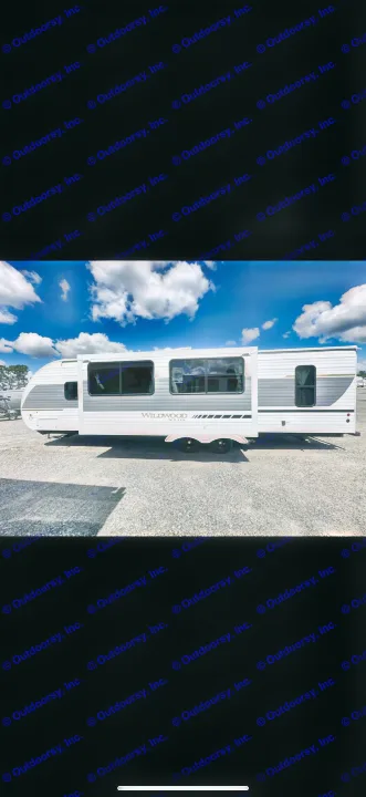 This spacious Wildwood X-Lite travel trailer is perfect for your next RV rental. Enjoy camping in comfort under a bright sky.. Forest River Wildwood X-Lite 2026