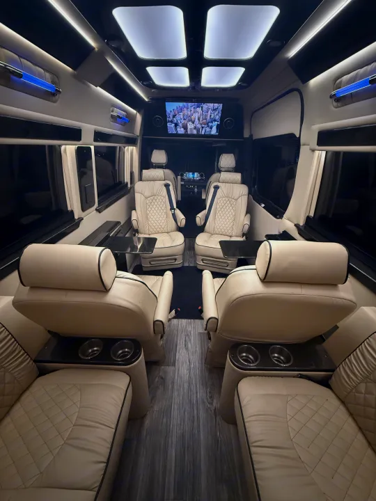 Experience premium travel in this RV rental's luxurious cream leather interior, ambient lighting, and entertainment system.. Ultimate Toys Ultimate Coach 2023
