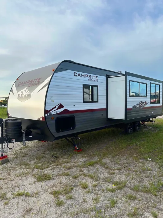 Campsite Reserve RV rental: A stylish travel trailer with an extended slide-out, perfect for outdoor adventure.. Forest River Campsite reserve 25MW 2024