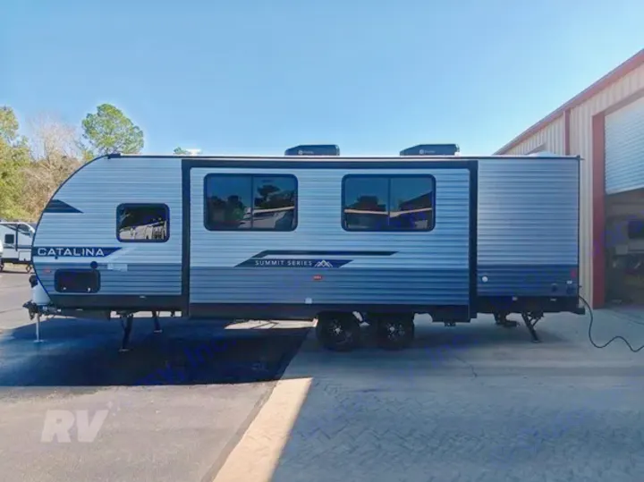 Side view of a silver and gray Catalina Summit Series travel trailer, ideal for your next RV rental adventure.. Other Catalina 2025