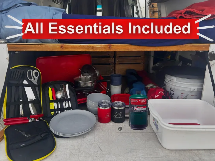 RV rental: All essentials included! This image displays kitchen gear, a camp stove, propane, plates, and travel mugs.. Ford Econoline 2012
