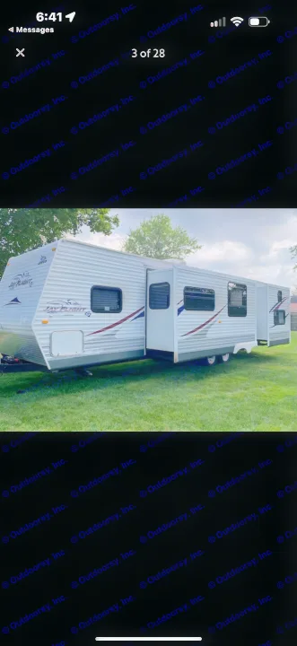 Large white Jayco Jay Flight travel trailer with multiple slide-outs, ideal for an rv rental, parked on green grass.. Jayco Jay Flight G2 2009