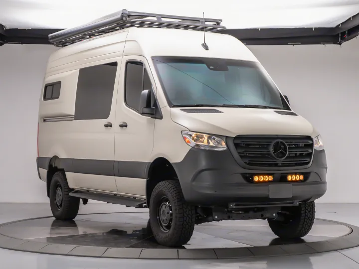 This custom Mercedes Sprinter van, ready for adventure, is an ideal rv rental. Features off-road tires, roof rack & awning.. MERCEDES-BENZ Sprinter 2500 AWD 2024
