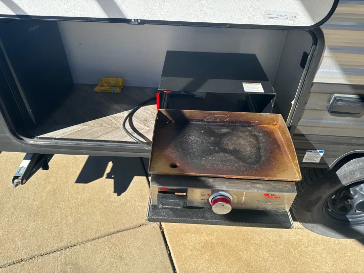 RV rental: Exterior compartment with EverChill cooler, pull-out Suburban griddle for convenient outdoor cooking & camping.. Forest River Salem FSX 2022