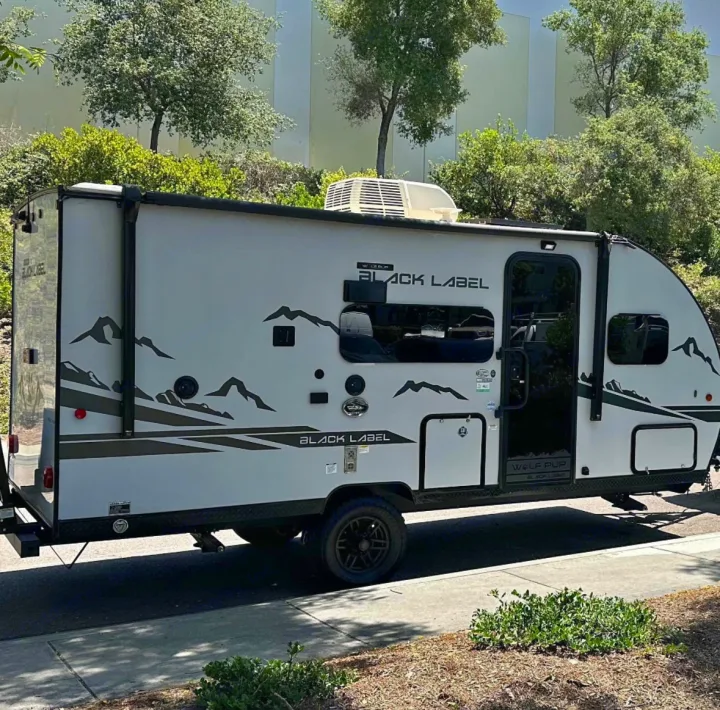 This rugged "BLACK LABEL" Wolf Pup travel trailer, ideal for rv rental, is ready for your next outdoor adventure.. Forest River Cherokee Wolf Pup 2023