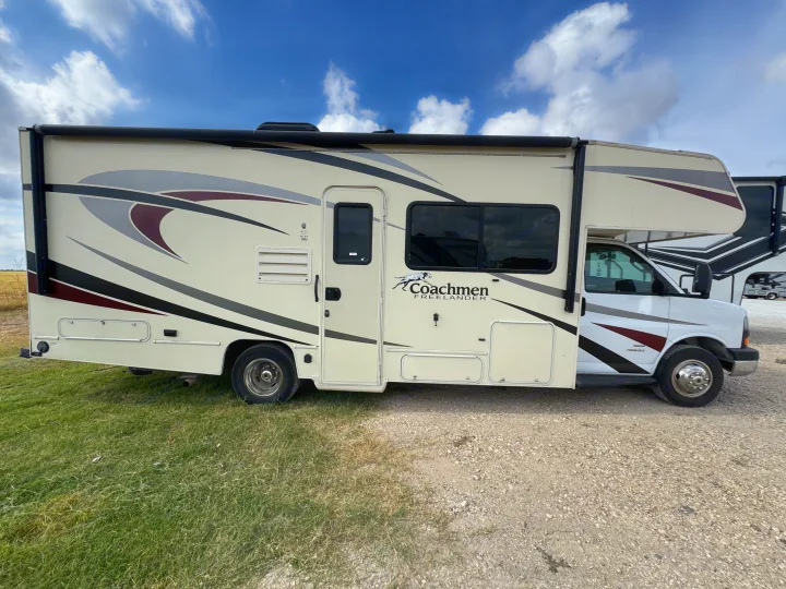 This Coachmen Freelander Class C RV rental is parked outdoors, ready for your next travel adventure.. Forest River Coachmen Freelander 2019