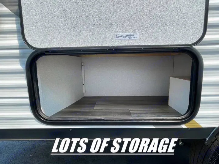 Empty, ample exterior storage in this RV rental, with a durable floor and clean walls for all your travel essentials.. Open Range Colt MBS 18 2026