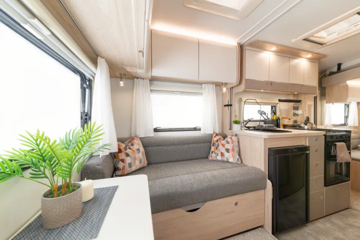 Stylish rv rental interior featuring a modern kitchen with appliances, comfortable sofa, and ample storage for travel.. Elddis Whirlwind GT 196 2026