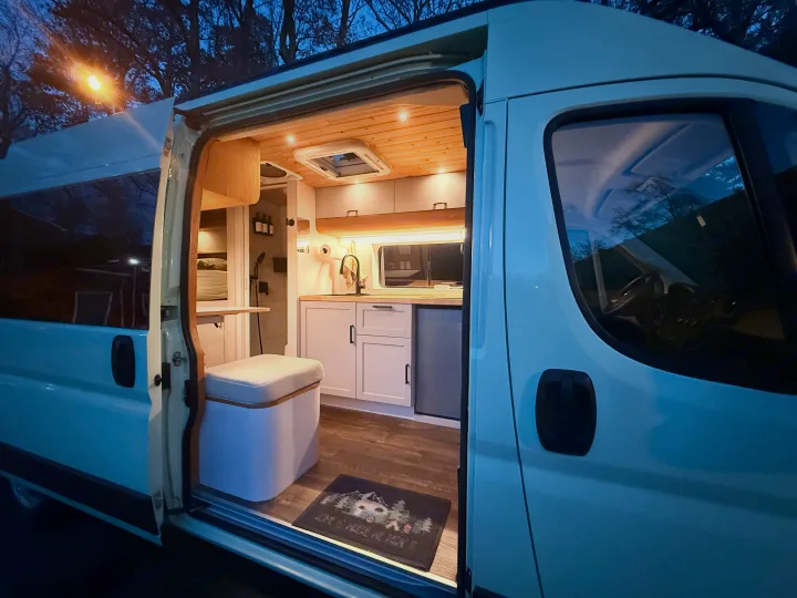 Discover your next rv rental adventure! This camper van boasts a bright, modern interior with kitchen, cozy seating, and wood details.. Dodge Pro Master High Roof 3500 Extended 2021