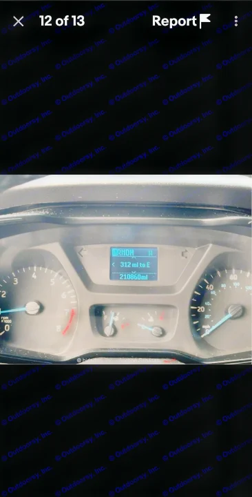Vehicle dashboard with 210,860 miles on the odometer & 312 miles to empty, relevant for an rv rental listing.. Ford Transit 2017
