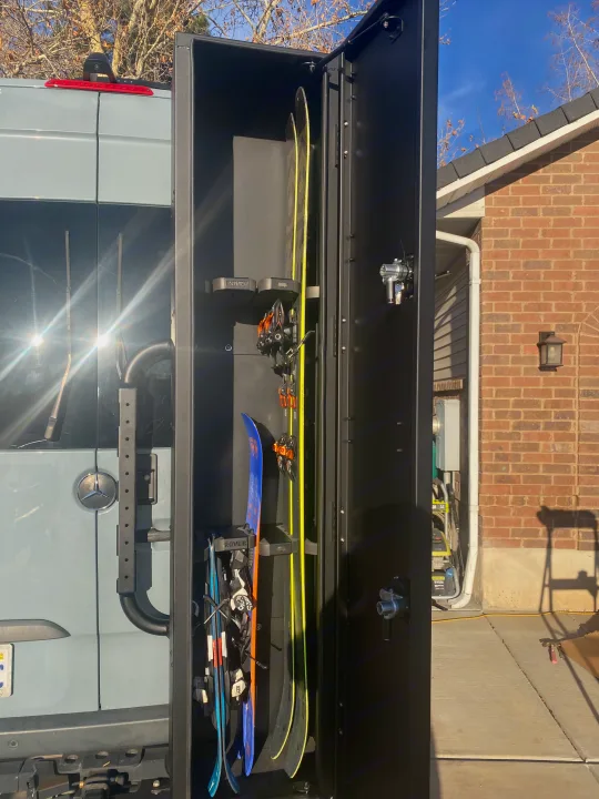 RV rental van with a rear gear locker, perfectly organizing skis and snowboards for your next adventure trip.. Mercedes-Benz Sprinter 2019