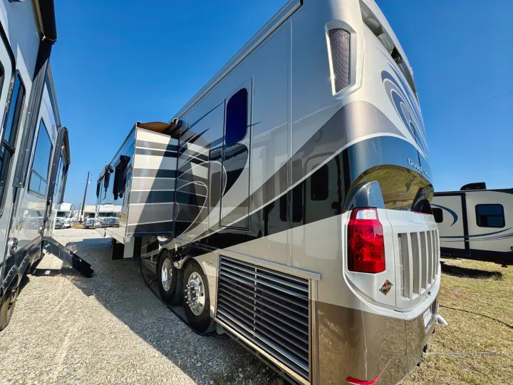 Modern silver RV with extended slide-out & sleek design. An ideal rv rental for comfortable road trips & outdoor exploration.. Dutch Star Dutch Star Motorhome 2017