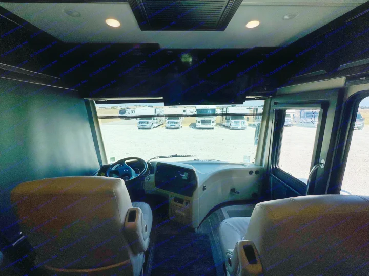 Driver's view from an RV rental, overlooking a lot of parked motorhomes, including Yellowstone and Winnebago models.. Dutch Star Dutch Star Motorhome 2017