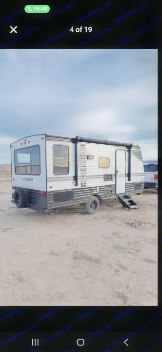 RV rental: Gray Hideout travel trailer in a dry desert, awning out. Perfect for camping and outdoor adventures.. Keystone RV Hideout 2022
