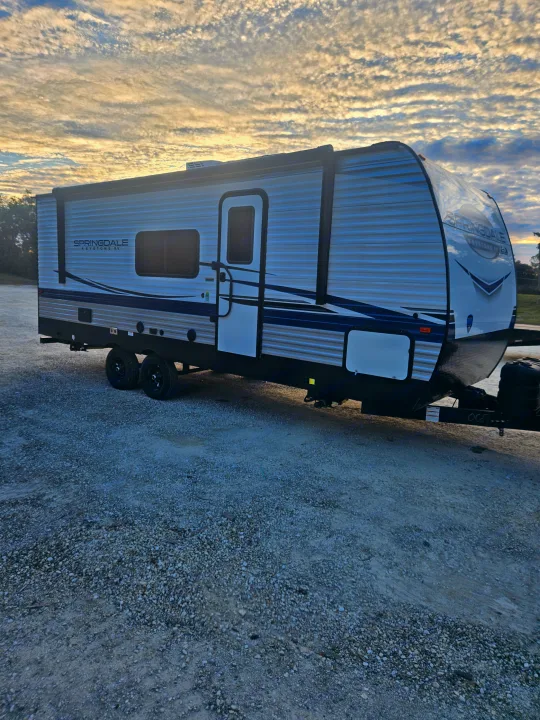 Stunning Springdale RV rental parked under a beautiful sky, ready for your next outdoor adventure.. Keystone RV Springdale 2024