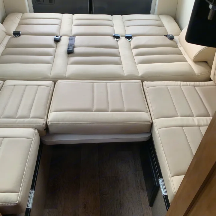 RV rental: Cream cushioned interior with seatbelts, easily converting from travel seats to a comfortable bed.. Coachmen Galleria 2020