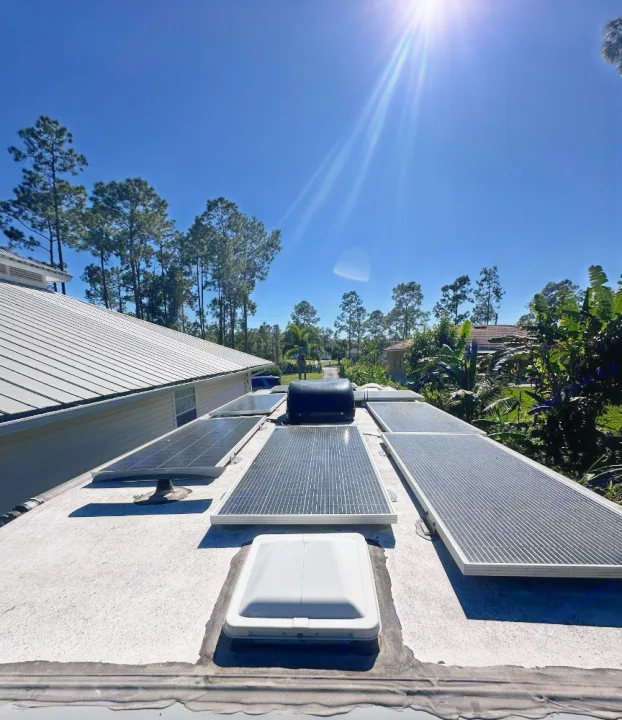 Sunny view of an RV rental's roof, featuring multiple solar panels for power. Ideal for sustainable outdoor trips!. Coachmen Crosstrek 23XG 2021