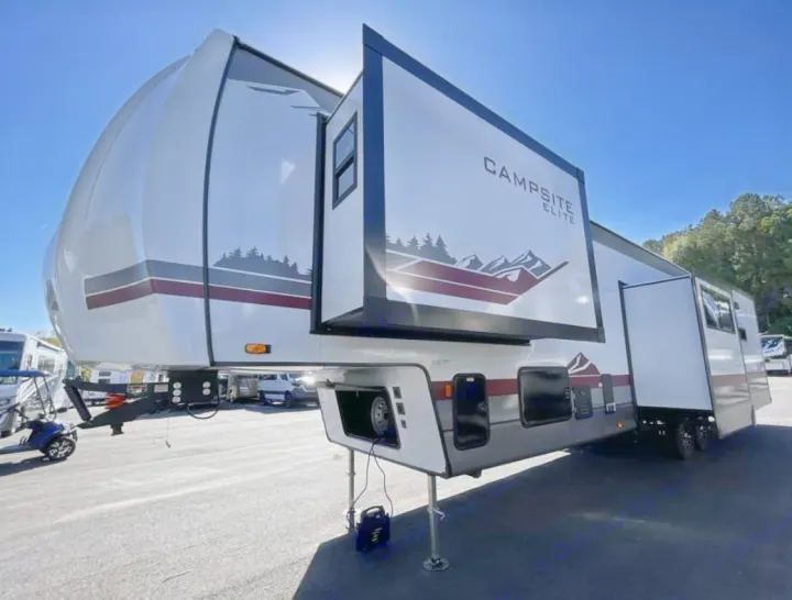 Spacious Campsite Elite fifth-wheel RV rental with extended slide-outs, featuring mountain graphics and sleek design.. FOREST RIVER Campsite Elite 36RF 2026