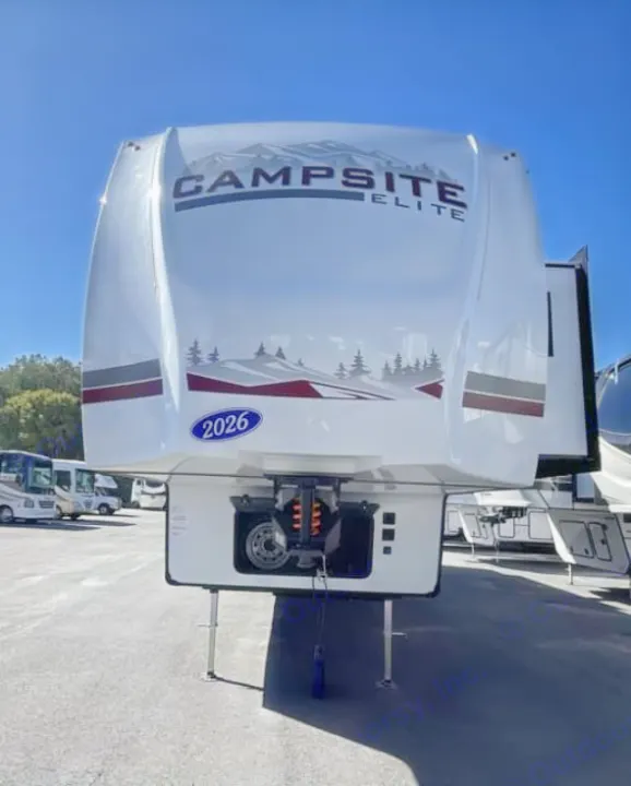 Front view of a white 2026 Campsite Elite fifth-wheel RV rental, parked outdoors under clear skies.. FOREST RIVER Campsite Elite 36RF 2026