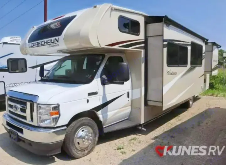 This white and beige Class C Leprechaun Coachmen RV rental features a Ford chassis and an extended slide-out.. Coachmen Leprechaun 2024