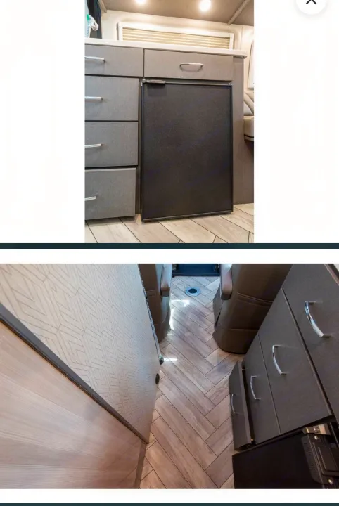 Modern RV rental interior with compact fridge, grey cabinets, and herringbone flooring for a comfortable travel experience.. Thor Tranquility 2025