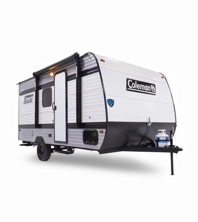 A white and grey Coleman travel trailer with an awning, perfect for RV rental adventures.. Keystone RV Coleman 2025