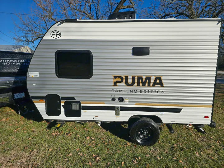 This sleek Puma Camping Edition travel trailer is ready for your next adventure. Explore the outdoors with this RV rental.. Palomino Puma Camping Edition 122BHCE 2026