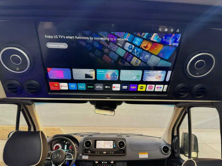 Enjoy premium entertainment in this RV rental with a large LG smart TV showing streaming apps like Netflix and Hulu.. OGV Luxury Coach V-Cruise 2026