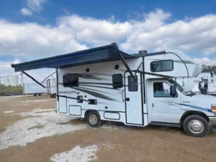 Ready for adventure, this white **rv rental**, a Class C with an extended awning, awaits. Perfect for your next trip.. Forest River Sunseeker LE 2024