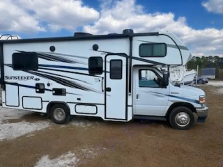 This white Class C Sunseeker RV rental, featuring dynamic black & grey graphics, is ready for your road trip or camping adventure.. Forest River Sunseeker LE 2024