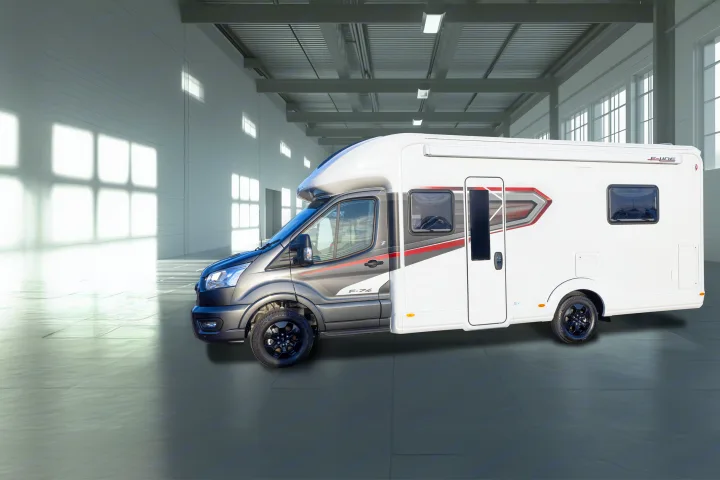 Sleek white and grey F-74 campervan, perfect for rv rental adventures. This modern motorhome is shown parked in a spacious garage.. Auto-Trail F74 2025