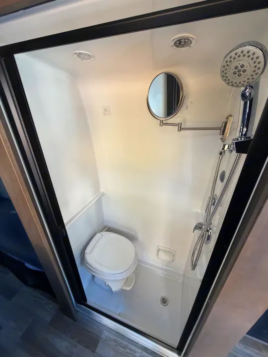 Inside this compact RV rental wet bath, you'll find a toilet, shower, adjustable mirror, and bright ceiling lights.. Cahaba Cahaba Class B 2022