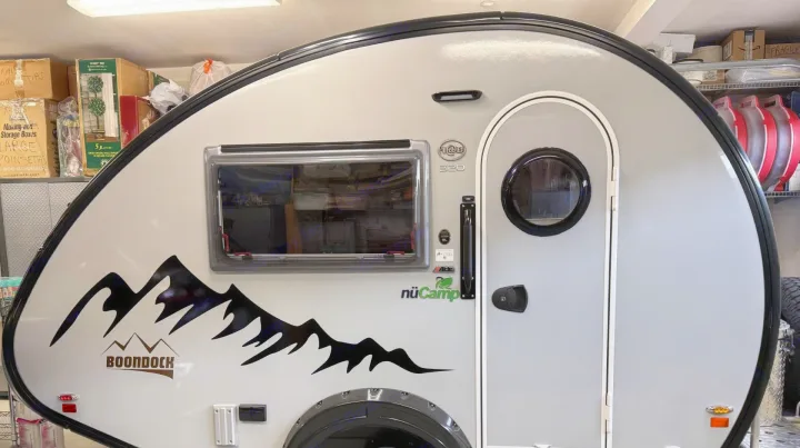 Explore the outdoors with this grey nuCamp Boondock teardrop camper, great for rv rental adventures.. nuCamp T@B 2022