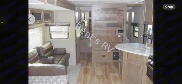 RV rental: inviting interior with living room sofa, kitchen, and wood finishes.. Dutchmen Aspen Trail 2019